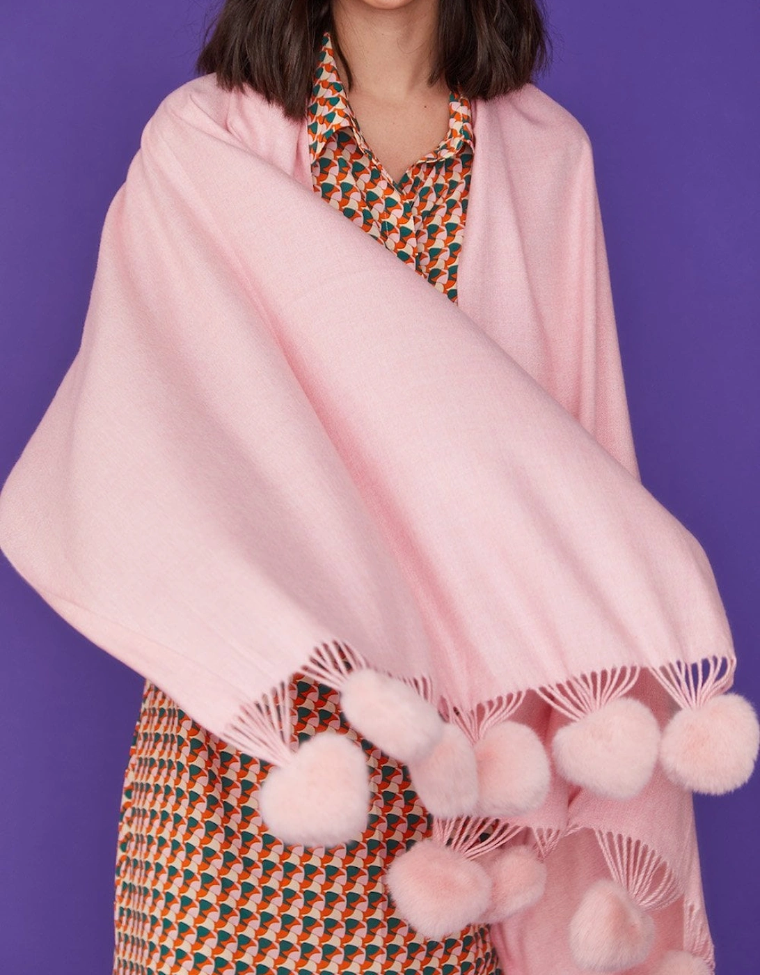Cashmere blend wrap with love heart poms in Pink