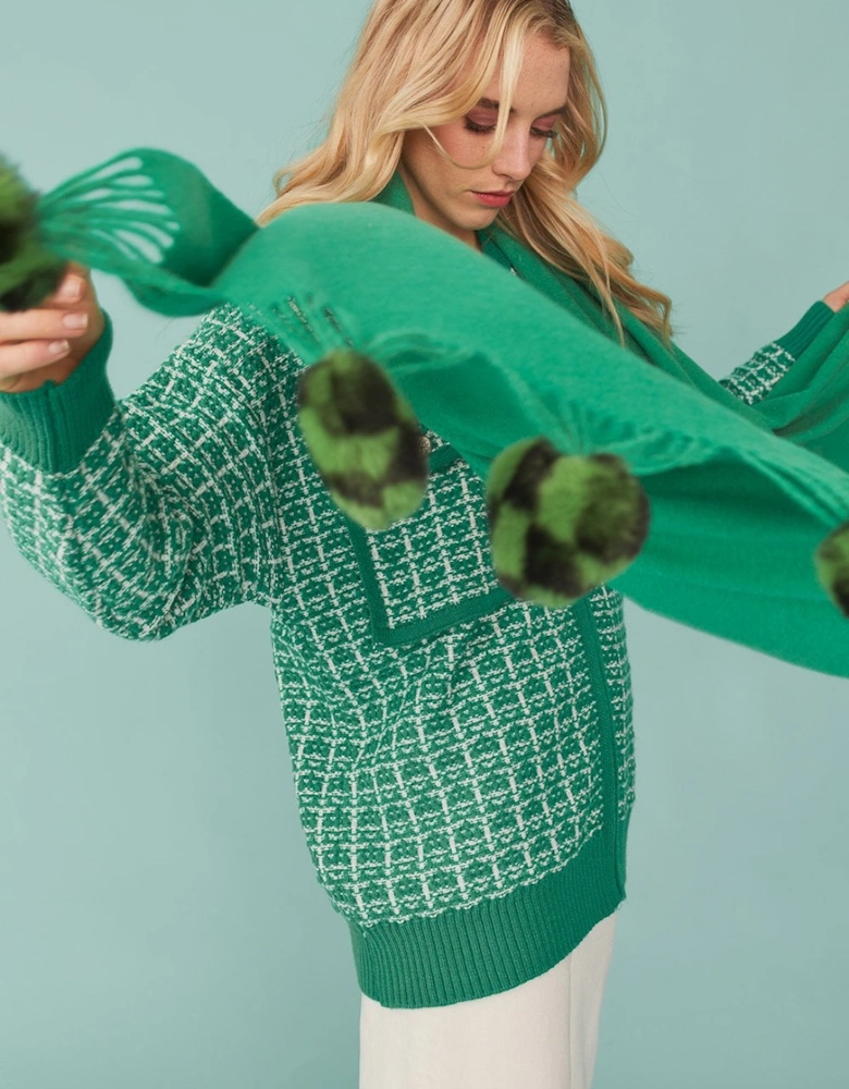 Cashmere blend wrap with green checkered poms