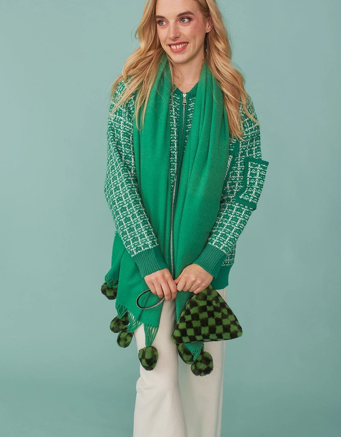 Cashmere blend wrap with green checkered poms