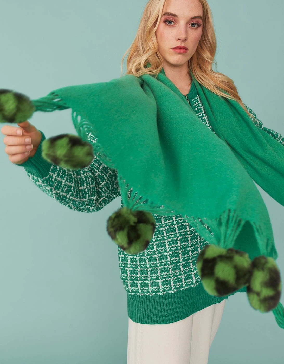 Cashmere blend wrap with green checkered poms