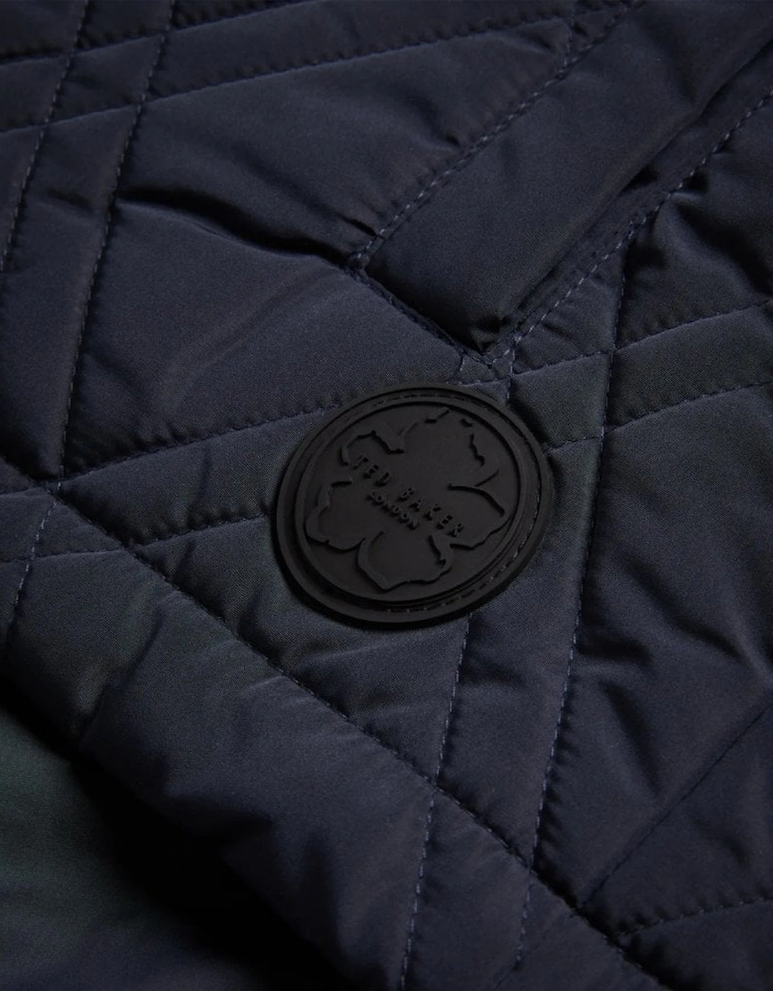 Navy Manby Quilted Showerproof Jacket.