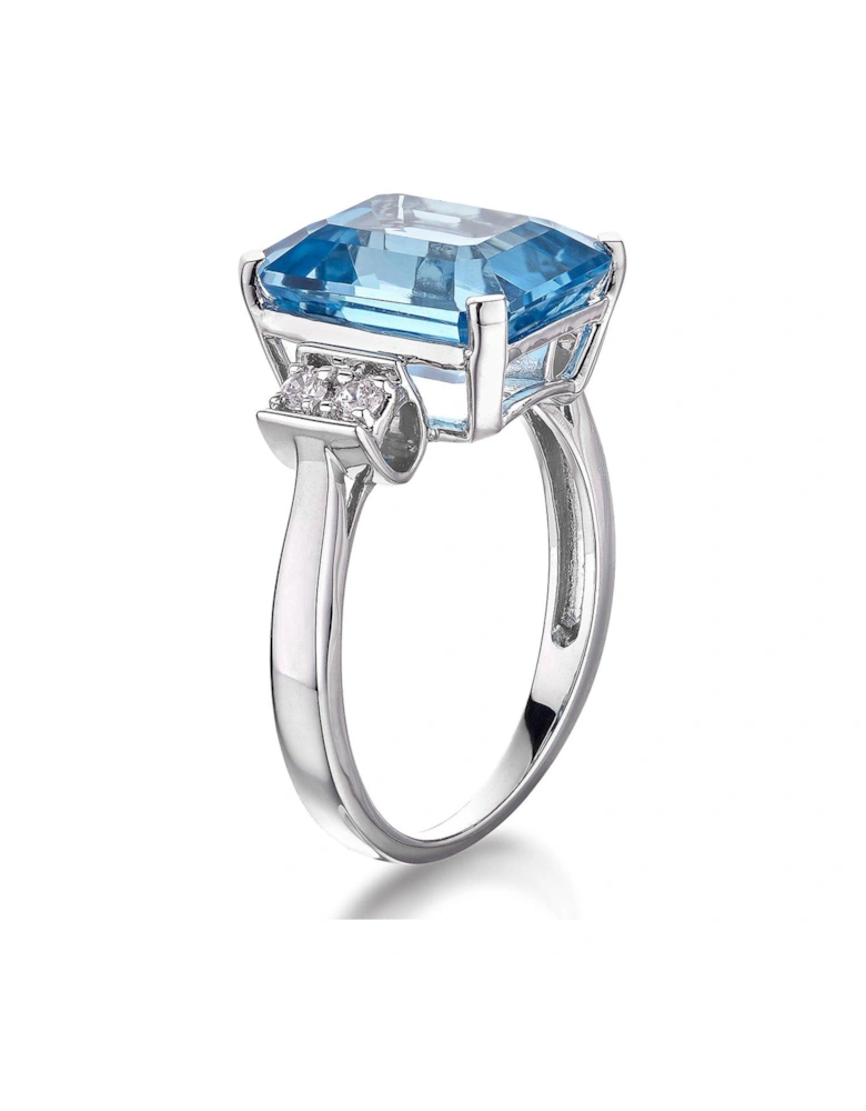 9ct White Gold Blue Topaz Emerald Cut Ring