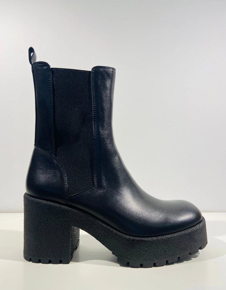 Black leather pull on ankle boots