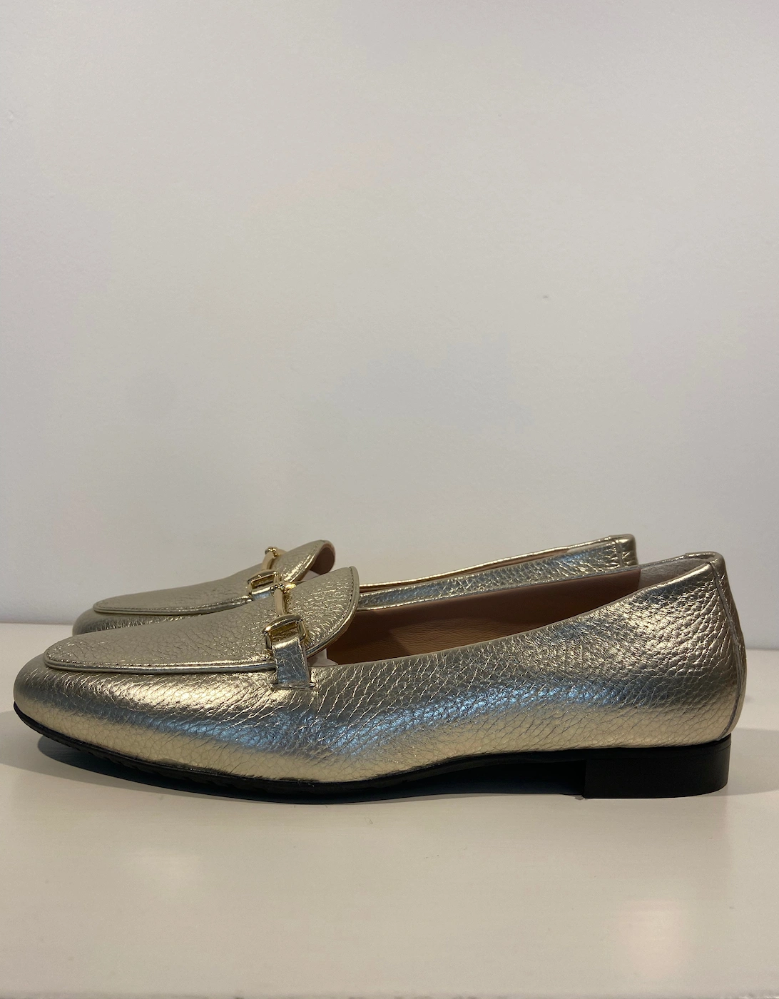 Gold Italian loafers with fine snaffle
