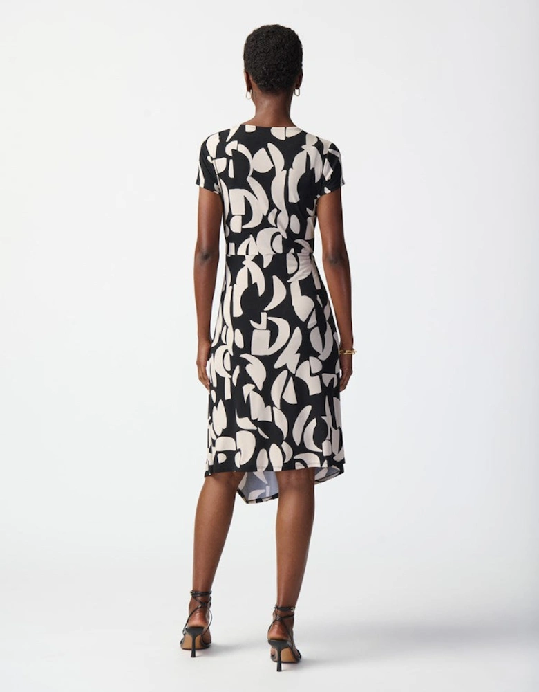 Abstract print silky knit wrap dress