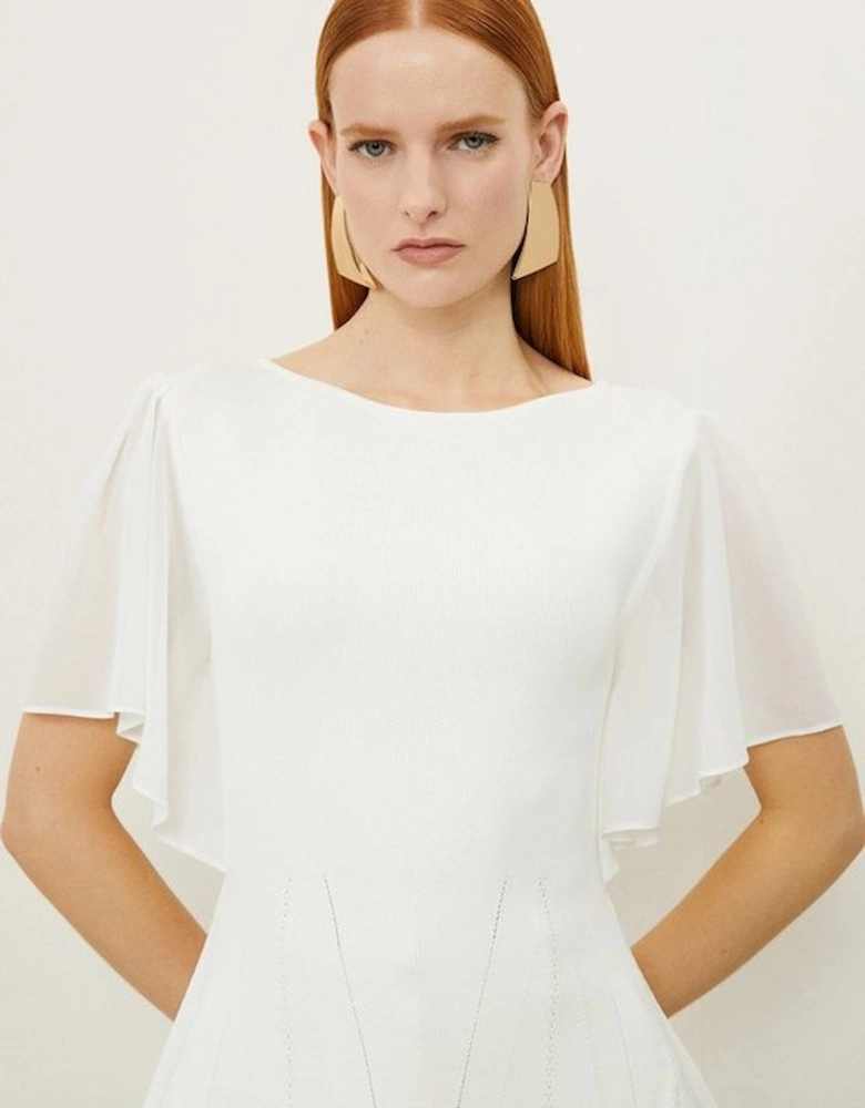 Viscose Blend Knit Chiffon Angel Sleeve Peplum Top