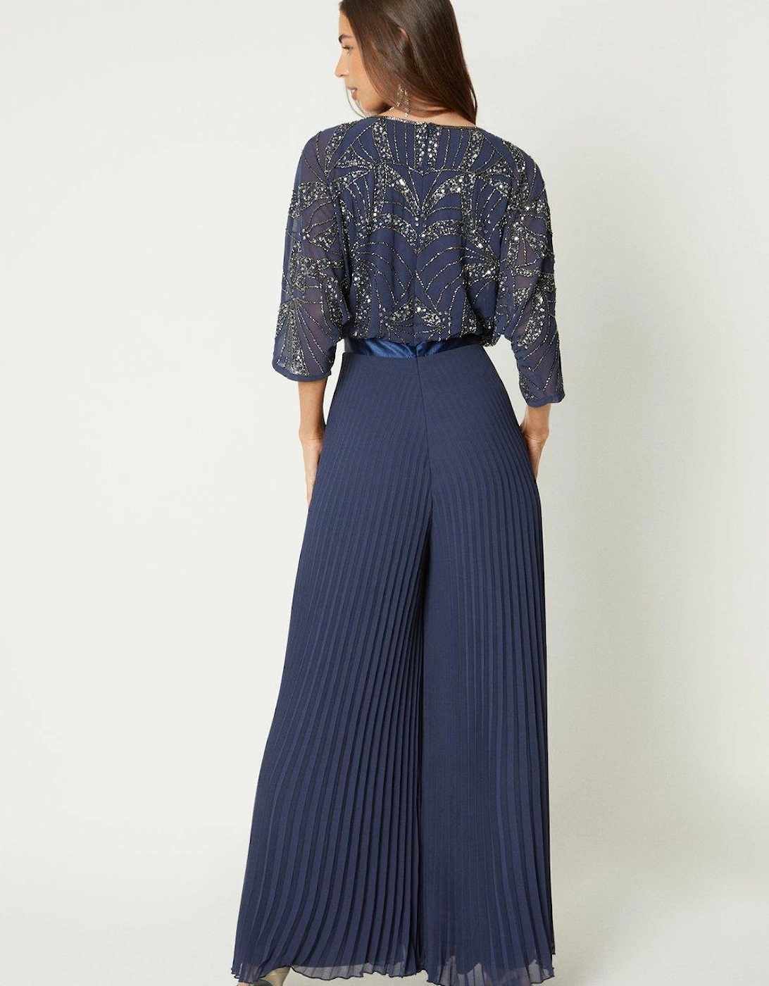 Embellished Cape Sleeve Pleat Jumpsuit