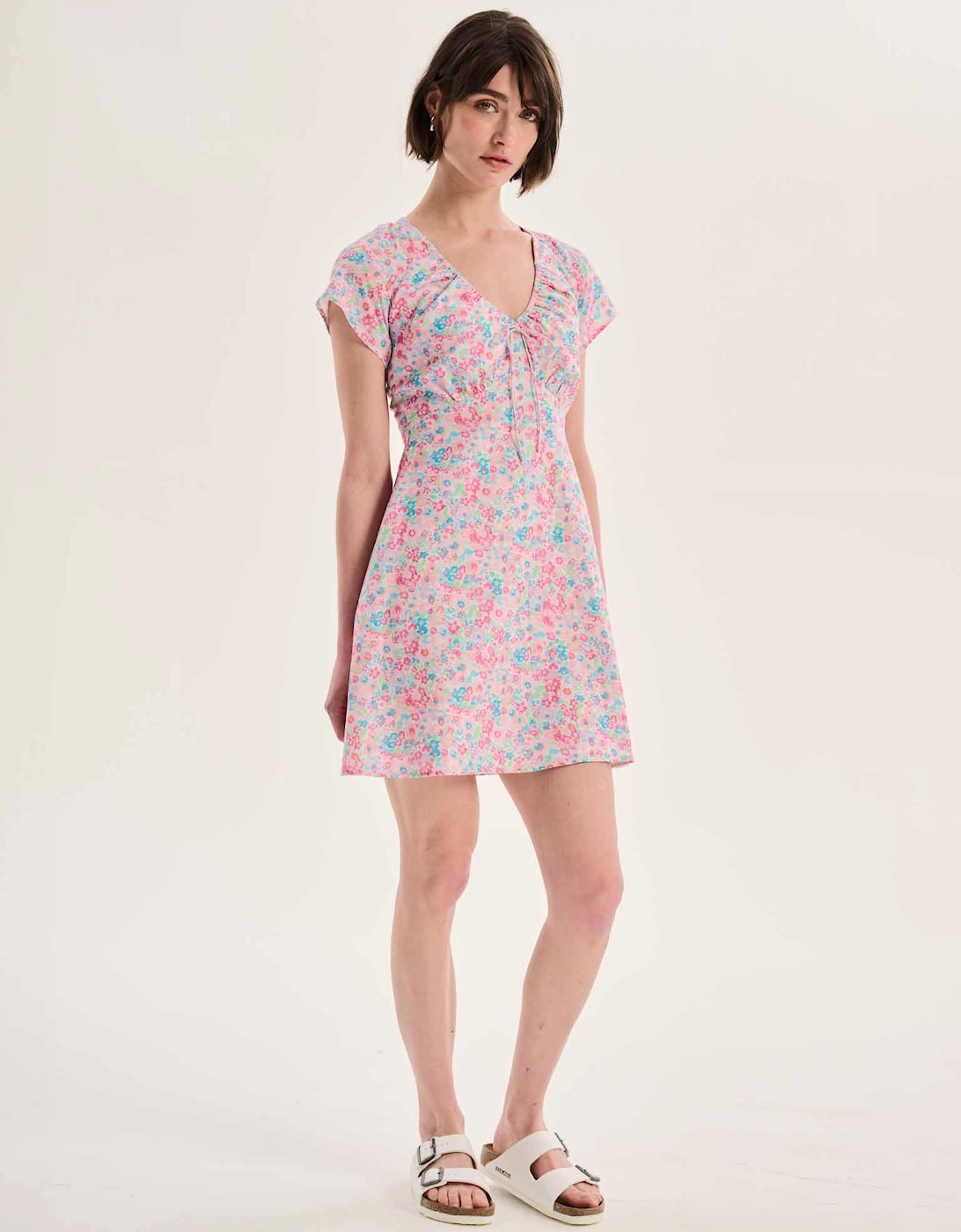 Dotty V Neck Ruched Mini Dress in Floral Print