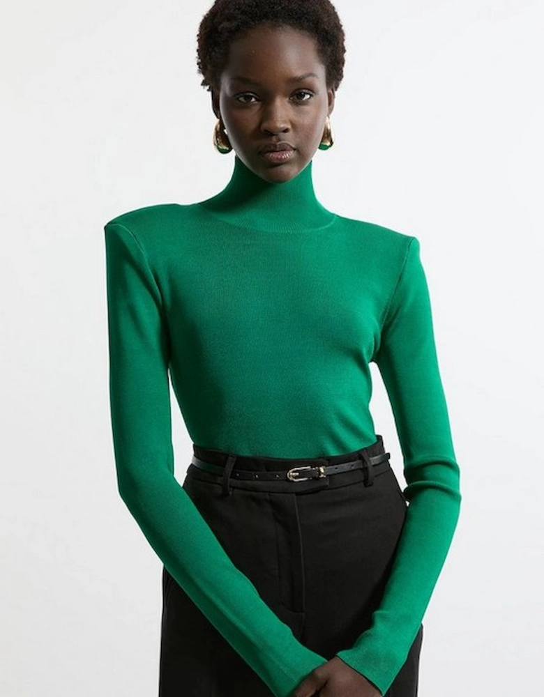 Slinky Drape Knit Power Shoulder Funnel Neck Top