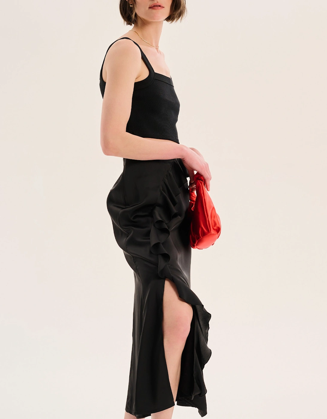 Udita Ruffle Detail Midi Satin Skirt in Black