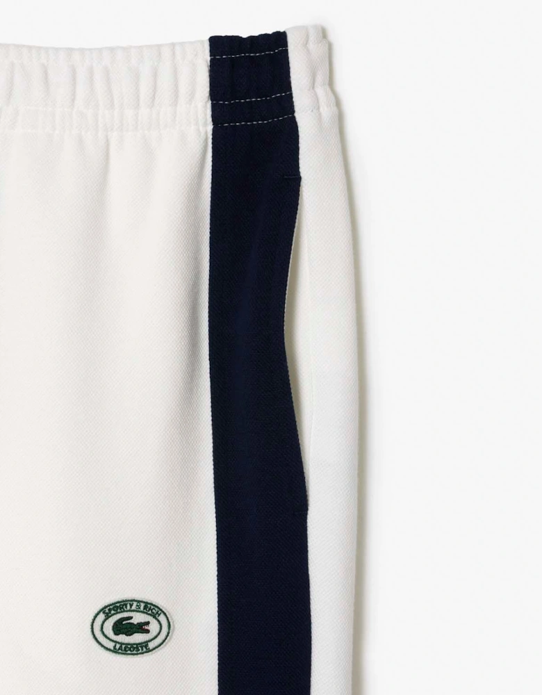 Sporty & Rich Stretch Track Pants