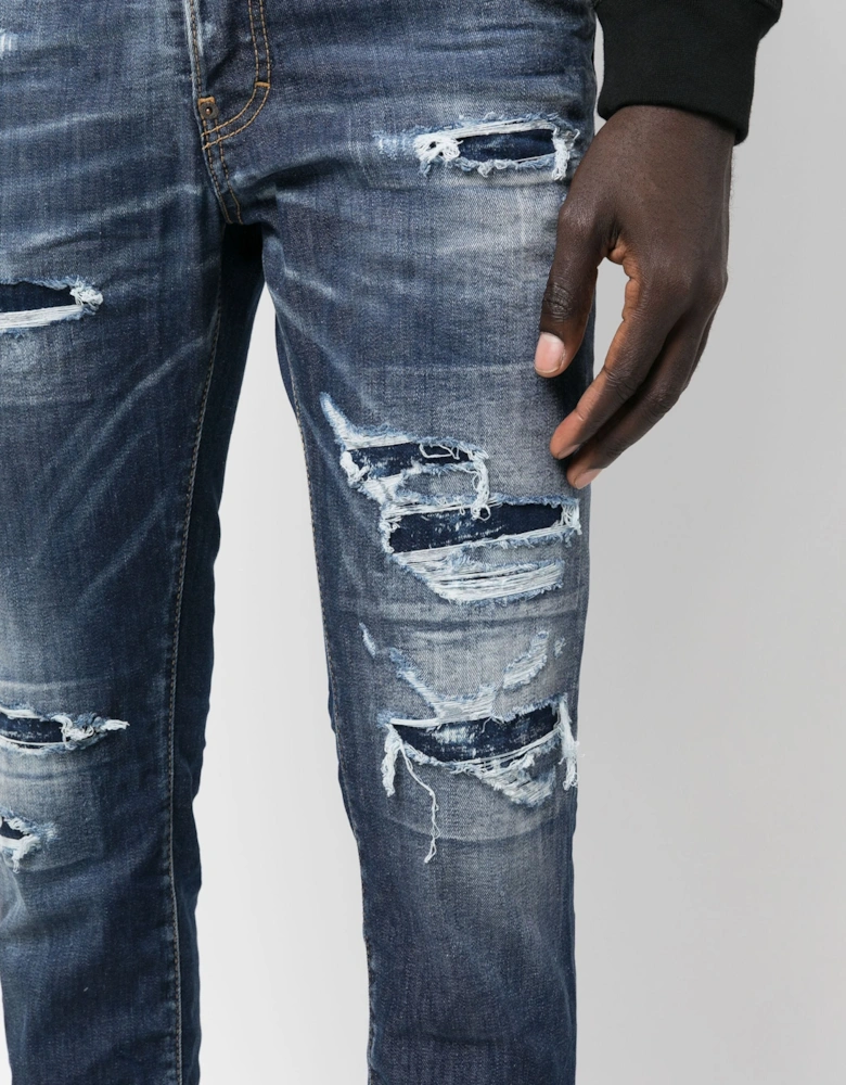 Distressed-finish Tapered-leg Jeans Blue