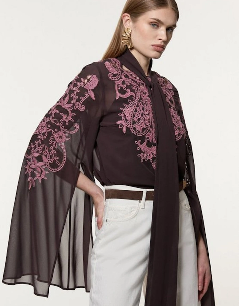 Cutwork And Beaded Georgette Tie Neck Cape Sleeve Woven Blouse