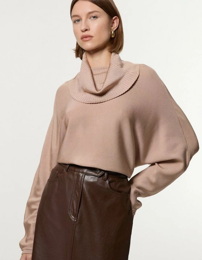 Polished Slinky Knit Oversized Roll Neck Top