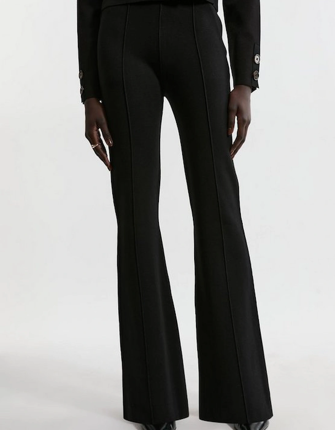 Milano Knit Pocket And Zip Kick Flare Knitted Trousers With Seam Detail