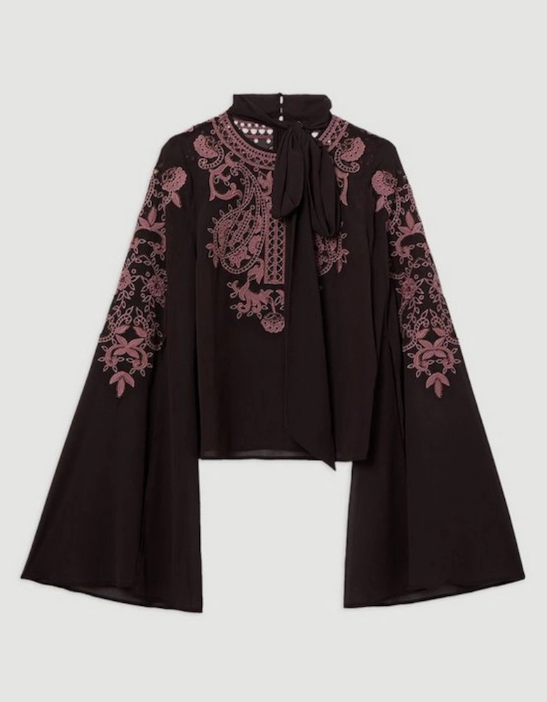 Cutwork And Beaded Georgette Tie Neck Cape Sleeve Woven Blouse