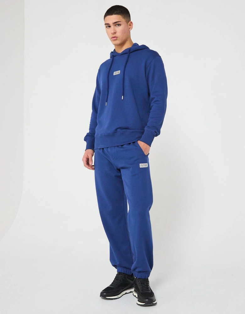 Metal Plaque Logo Jersey Joggers - Blue
