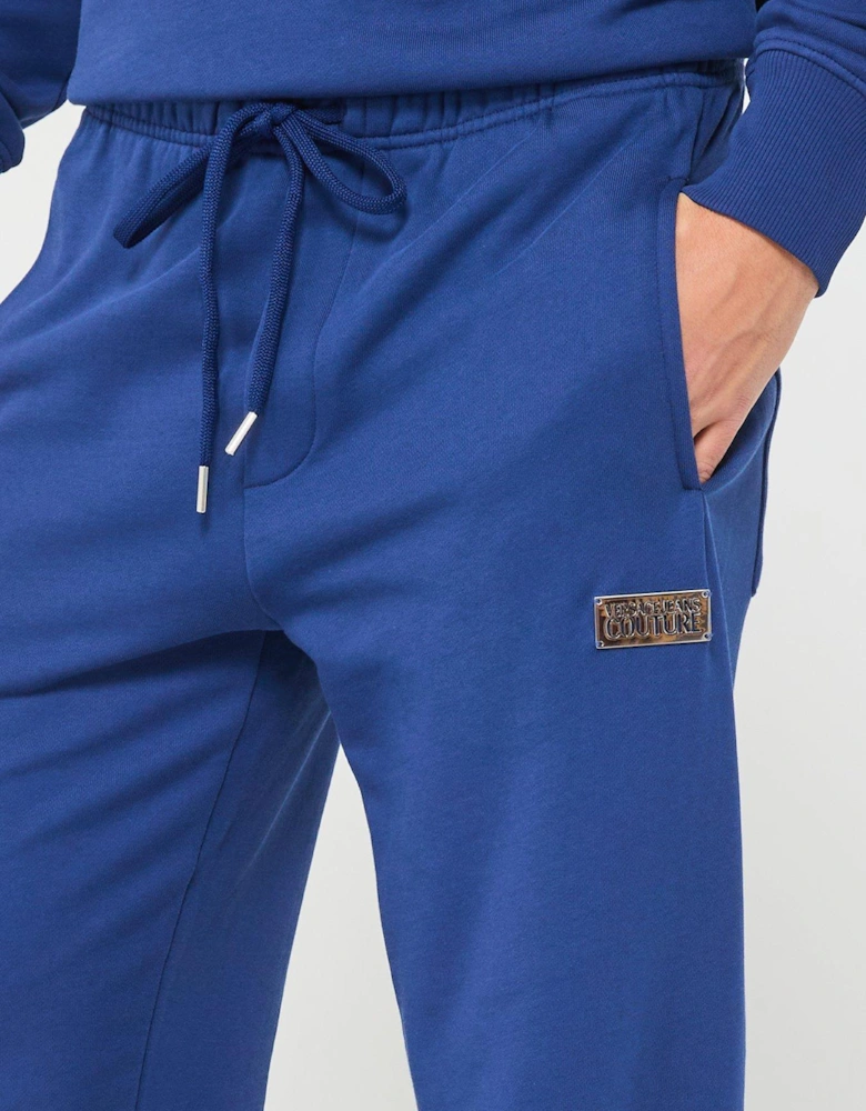 Metal Plaque Logo Jersey Joggers - Blue