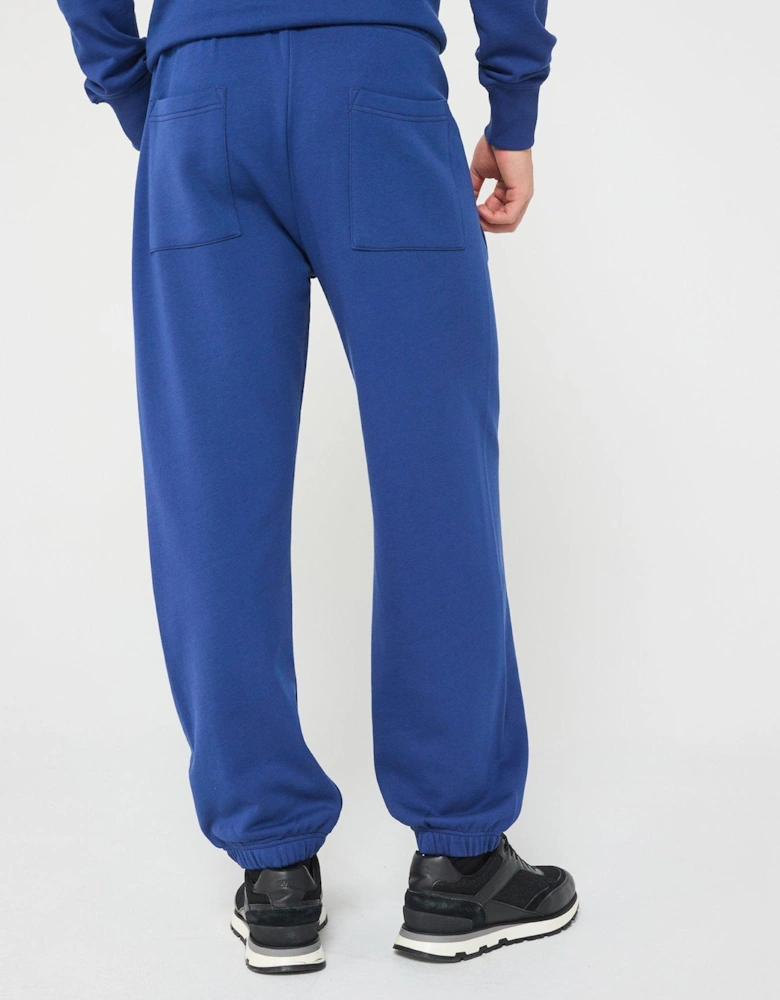 Metal Plaque Logo Jersey Joggers - Blue