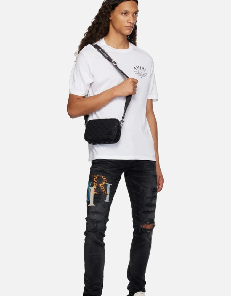 Leather Staggered Logo Ripped Jeans in Black