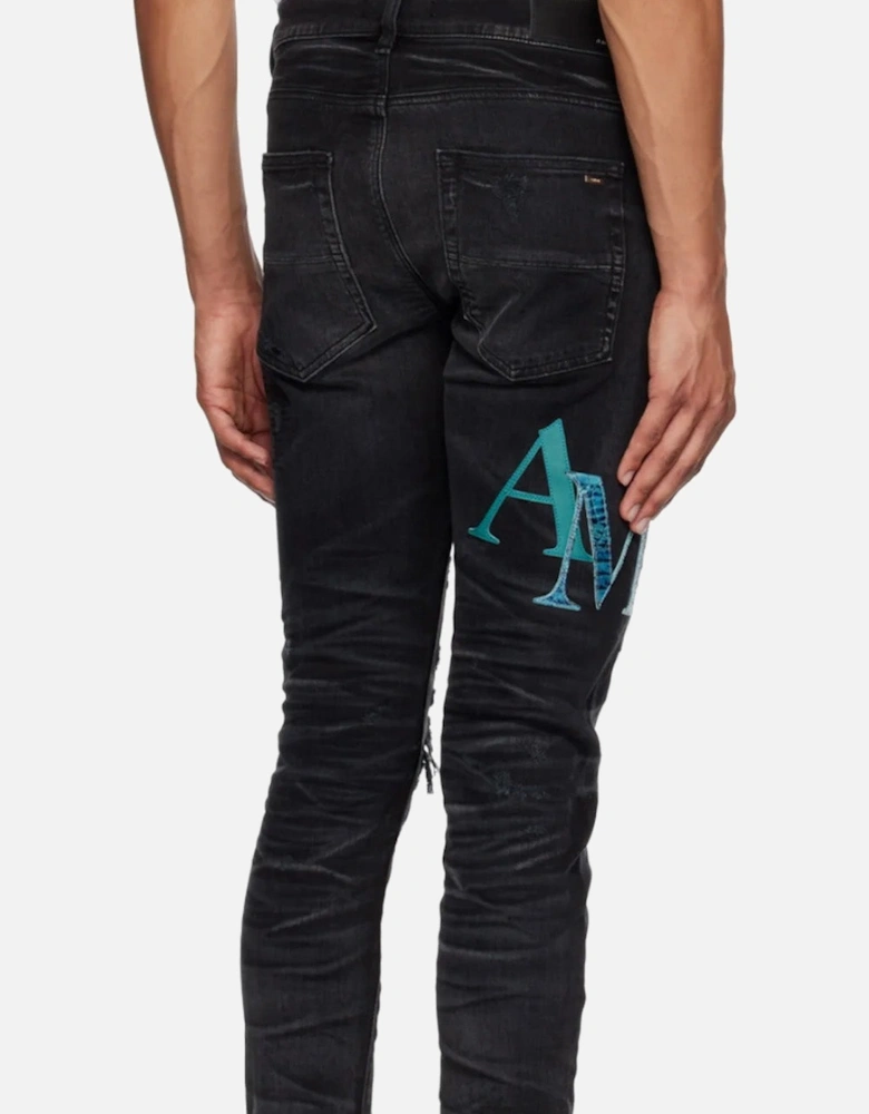 Leather Staggered Logo Ripped Jeans in Black