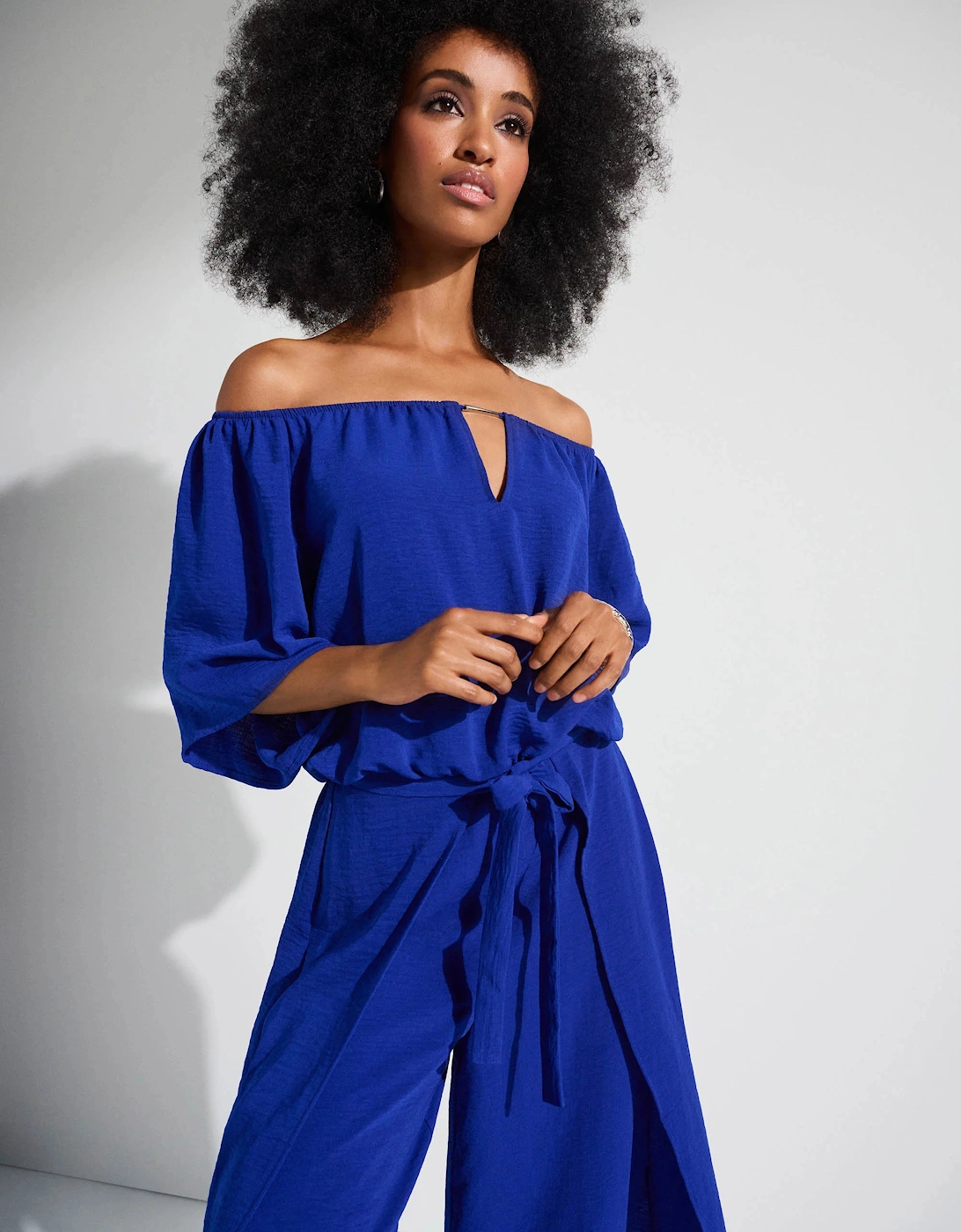 Gauze off shoulder culotte jumpsuit
