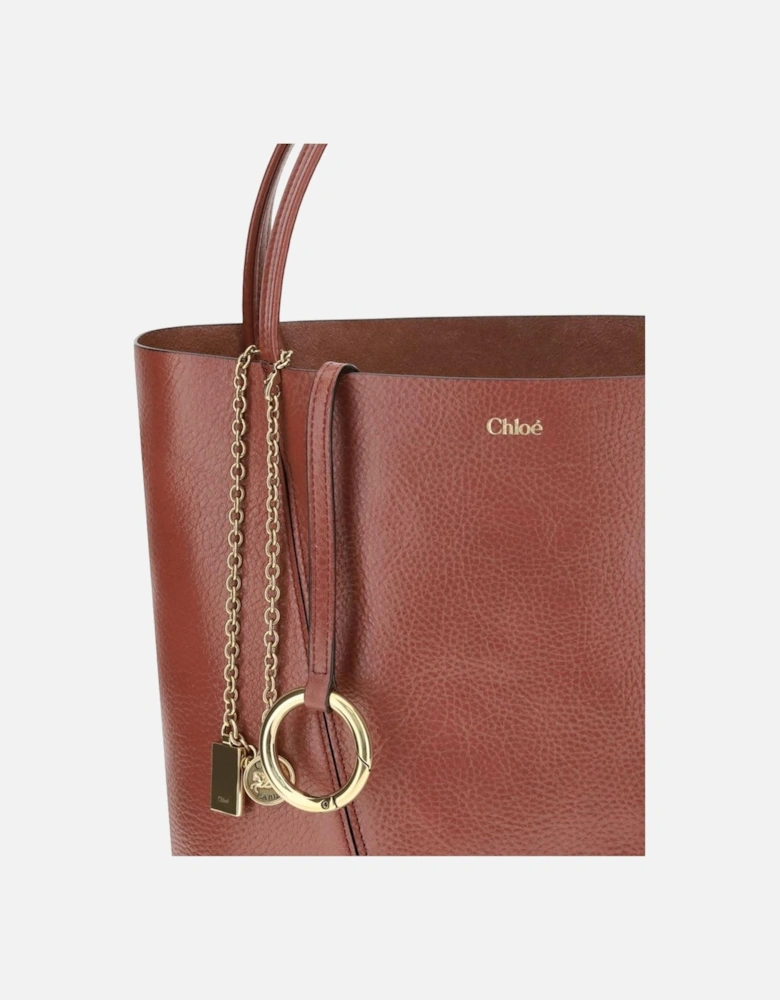 Leather Spin Shoulder Bag with Monogram Detailing Women - Brown