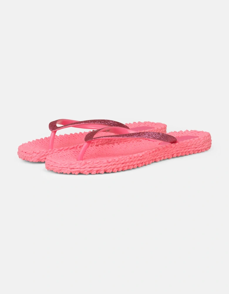 Neon pink flip flop