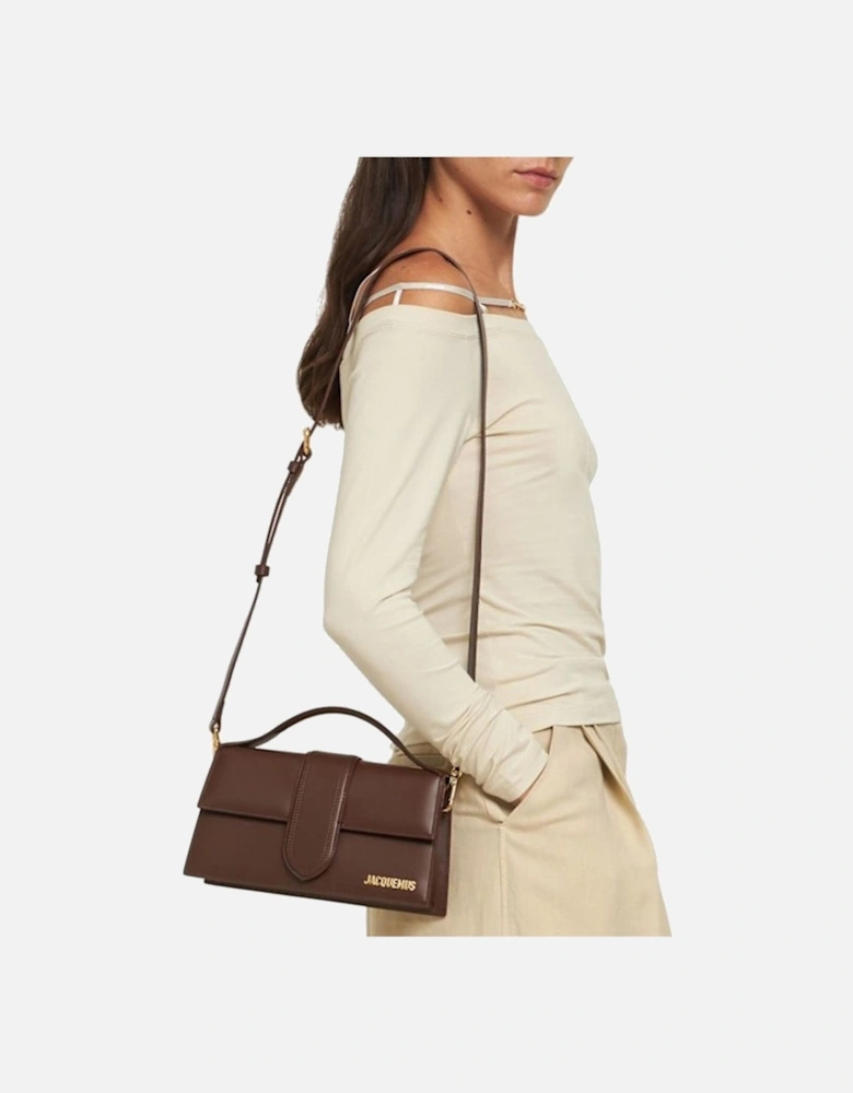 Elegant Leather Handbag with Top Handle and Adjustable Shoulder Strap