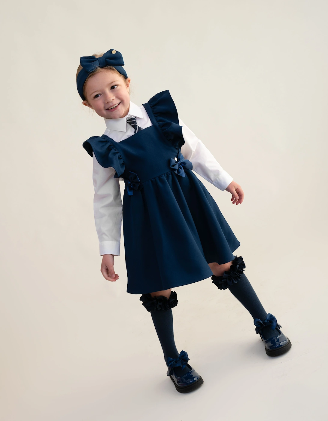 Girls Navy Bow Pinafore Dress, 6 of 5