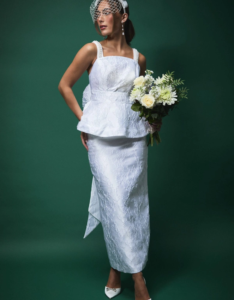 Lisa Tan Pearl Strap Peplum Bridal Top With Statement Bow Detail