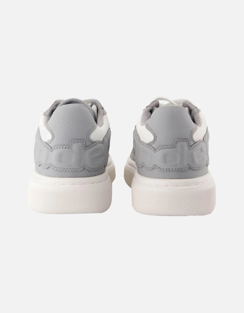 Puff Embossed Calf Leather Sneakers with Round Toe and Lace Closure