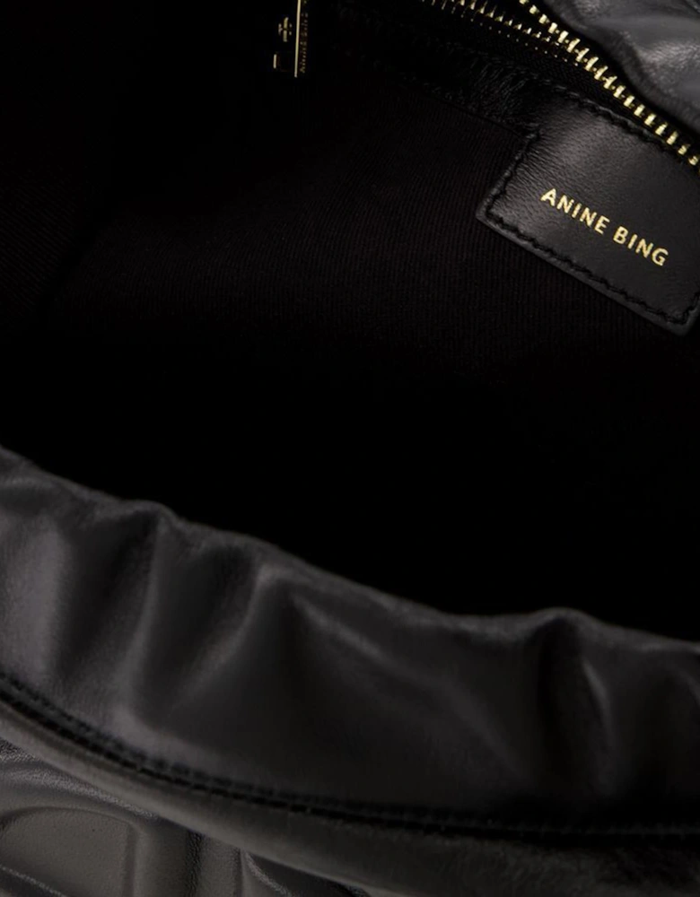 Quilted Leather Shoulder Bag with Magnetic Clasp and Interior Pockets