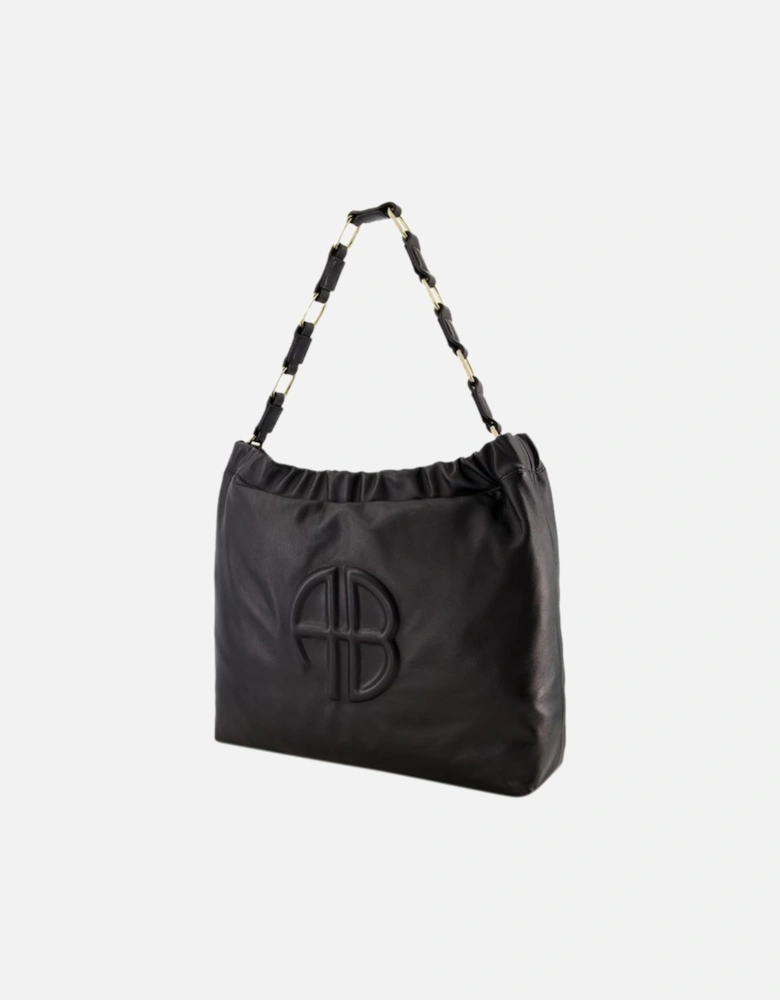 Quilted Leather Shoulder Bag with Magnetic Clasp and Interior Pockets