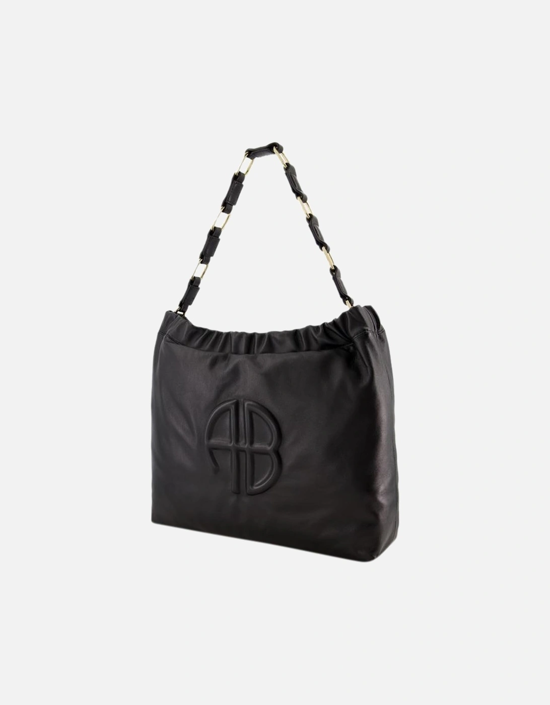 Quilted Leather Shoulder Bag with Magnetic Clasp and Interior Pockets