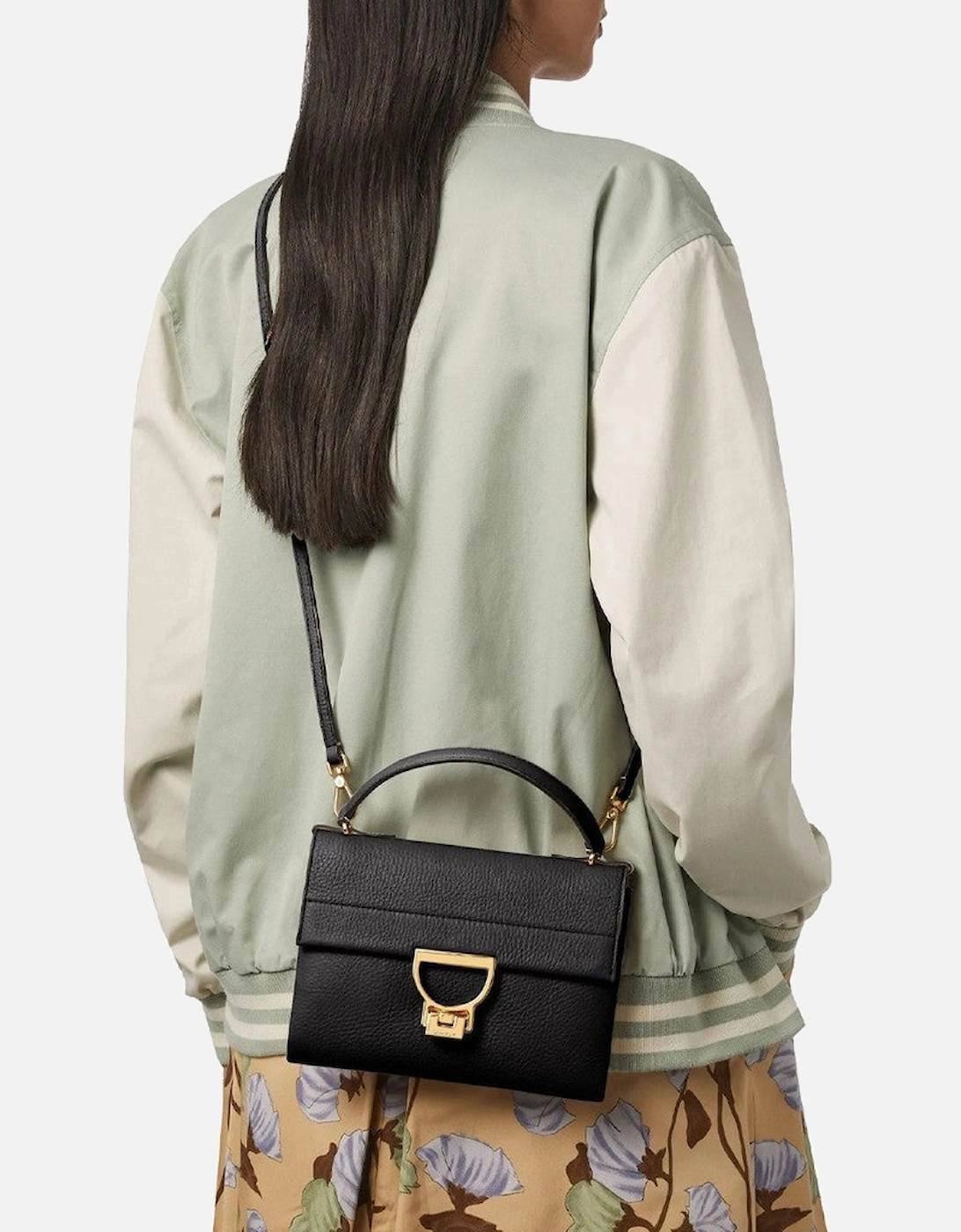 Leather Handbag with Adjustable Strap and Metallic Fastening