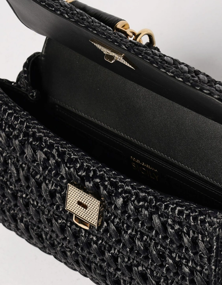 Elegant Leather Handbag with Top Handle and Gold-Tone Hardware