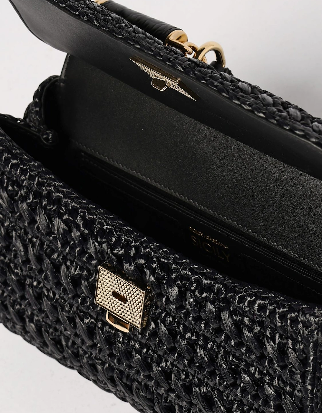 Elegant Leather Handbag with Top Handle and Gold-Tone Hardware