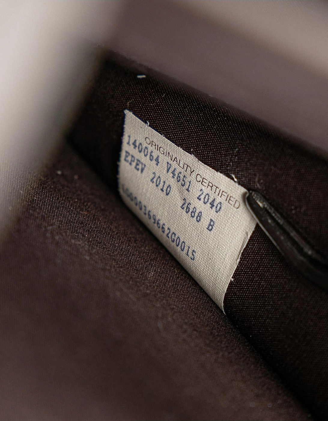 Nappa Leather Woven Briefcase with Structured Handle and Flip-Lock Closures
