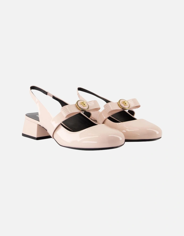 Medusa Buckle Slingback Pumps
