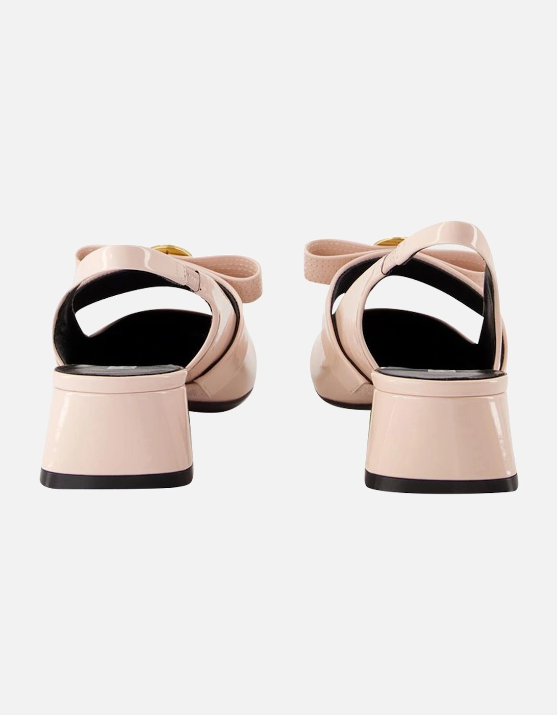 Medusa Buckle Slingback Pumps
