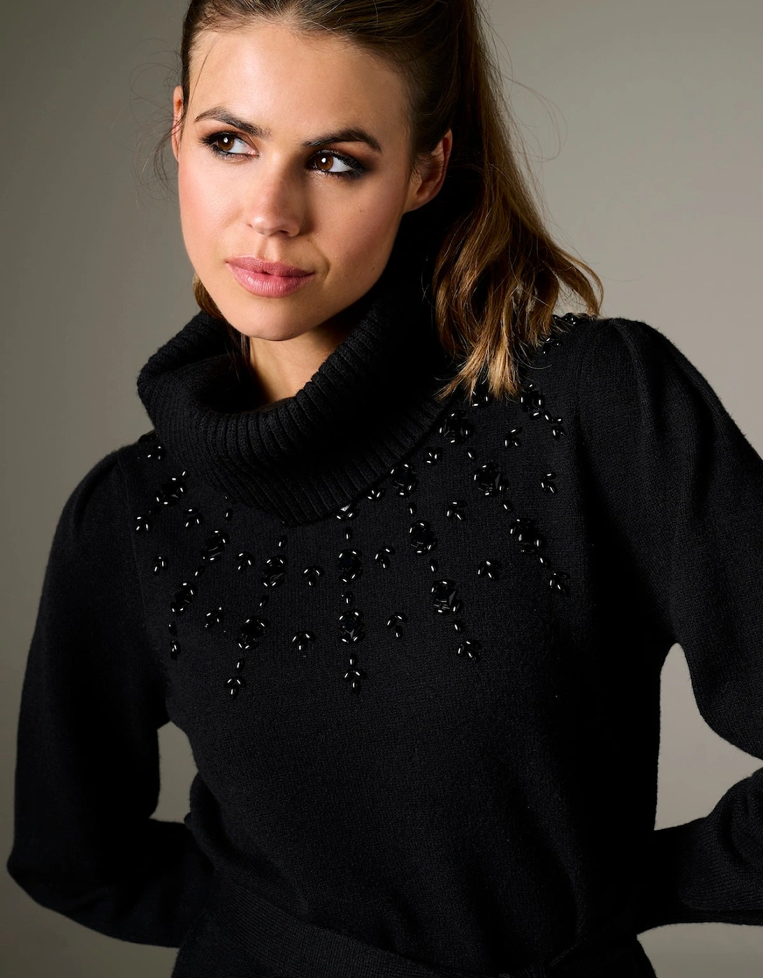 Black knitted dress with bead detail