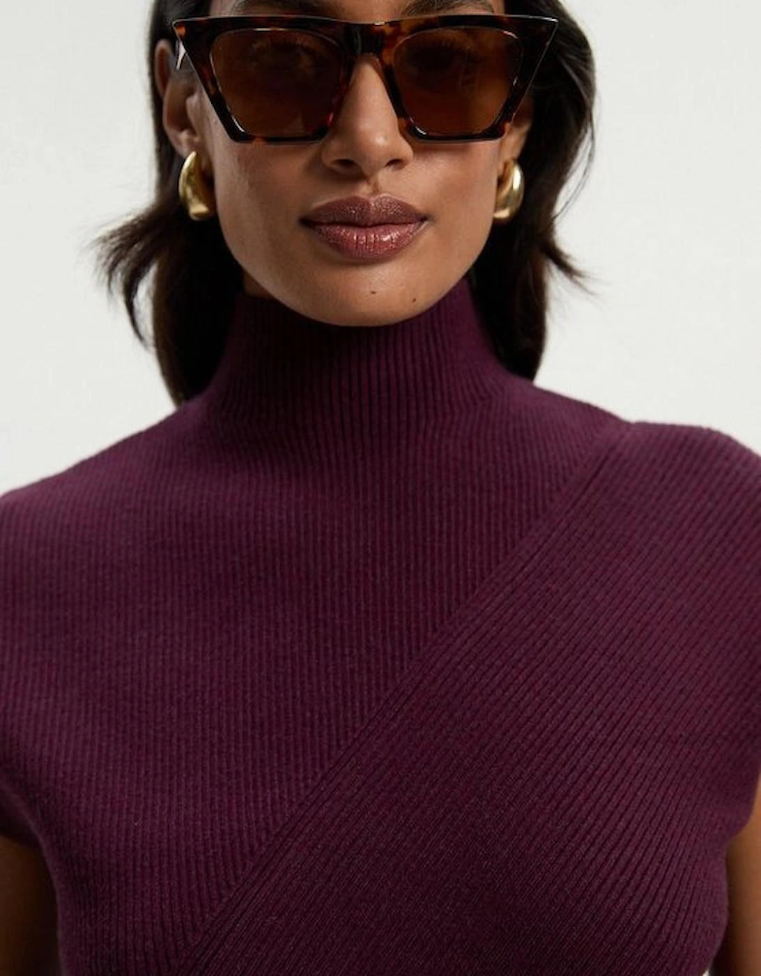 Soft Ribbed Asymmetric Hem Knitted Top
