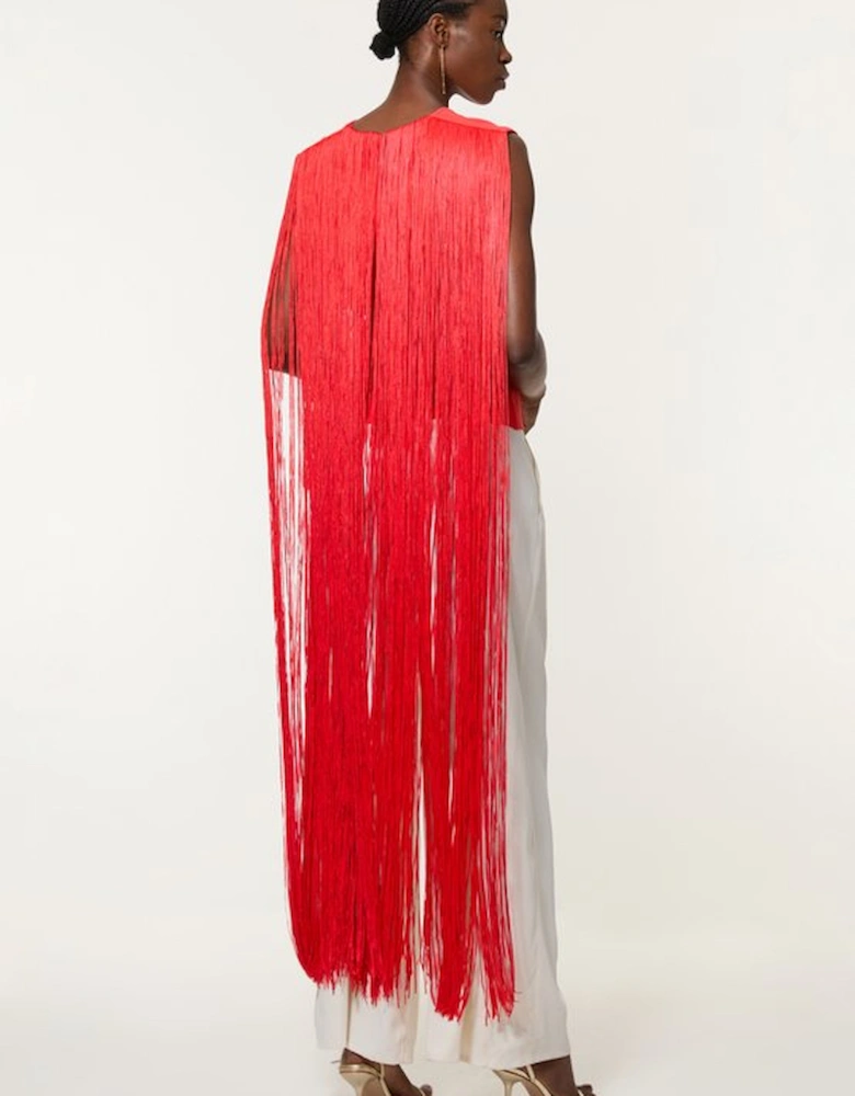 Figure Form Bandage Knit Long Tassel Cape Top