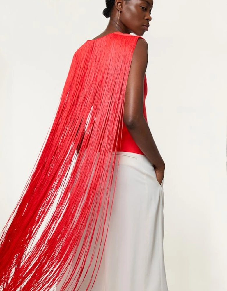 Figure Form Bandage Knit Long Tassel Cape Top