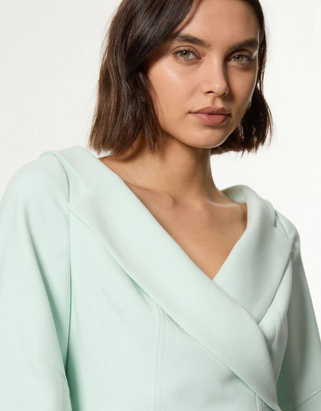 Compact Stretch Tailored Assymetric Peplum Jacket