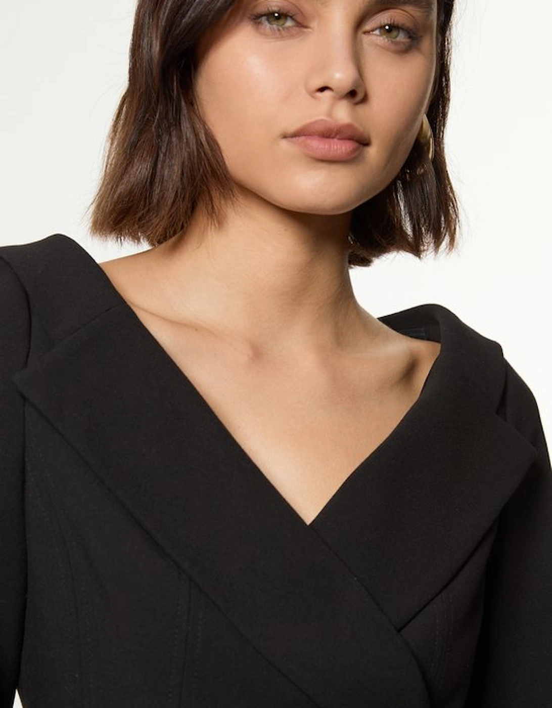 Compact Stretch Tailored Assymetric Peplum Jacket