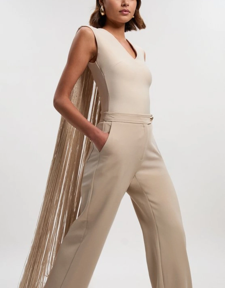 Figure Form Bandage Knit Long Tassel Cape Top