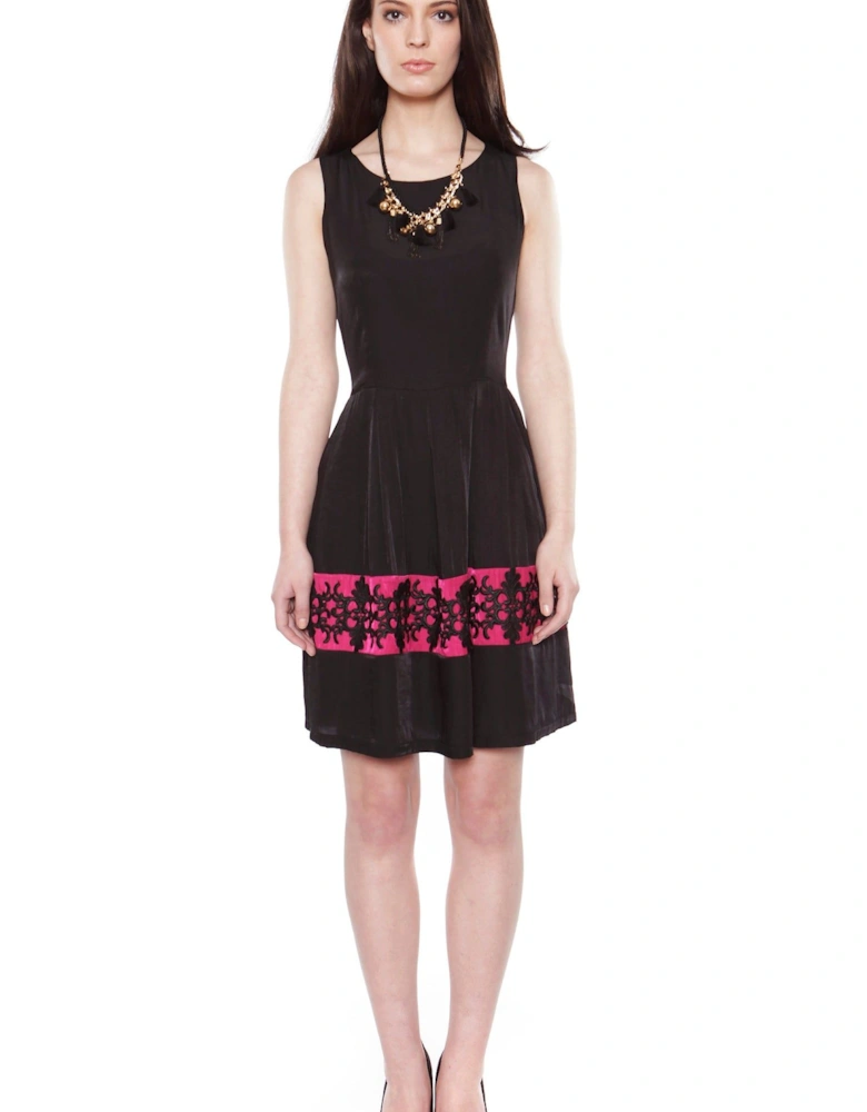 Sophisticated Black Dress with Embellished Hem