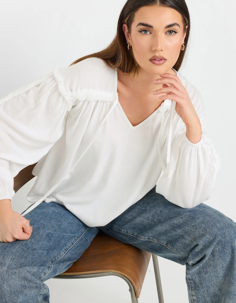 Tall Fringed Seam Tie Neck Blouse